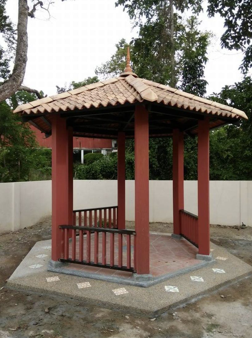 Chinese hexagonal pavilion with red timber posts and clay-tile roof, built by GP FloraL