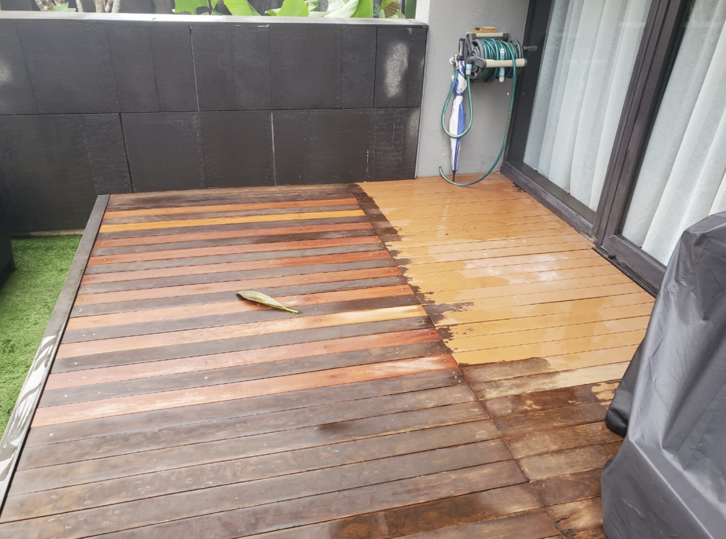 Timber deck stained and finished on a home garden patio, built by GP FloraL