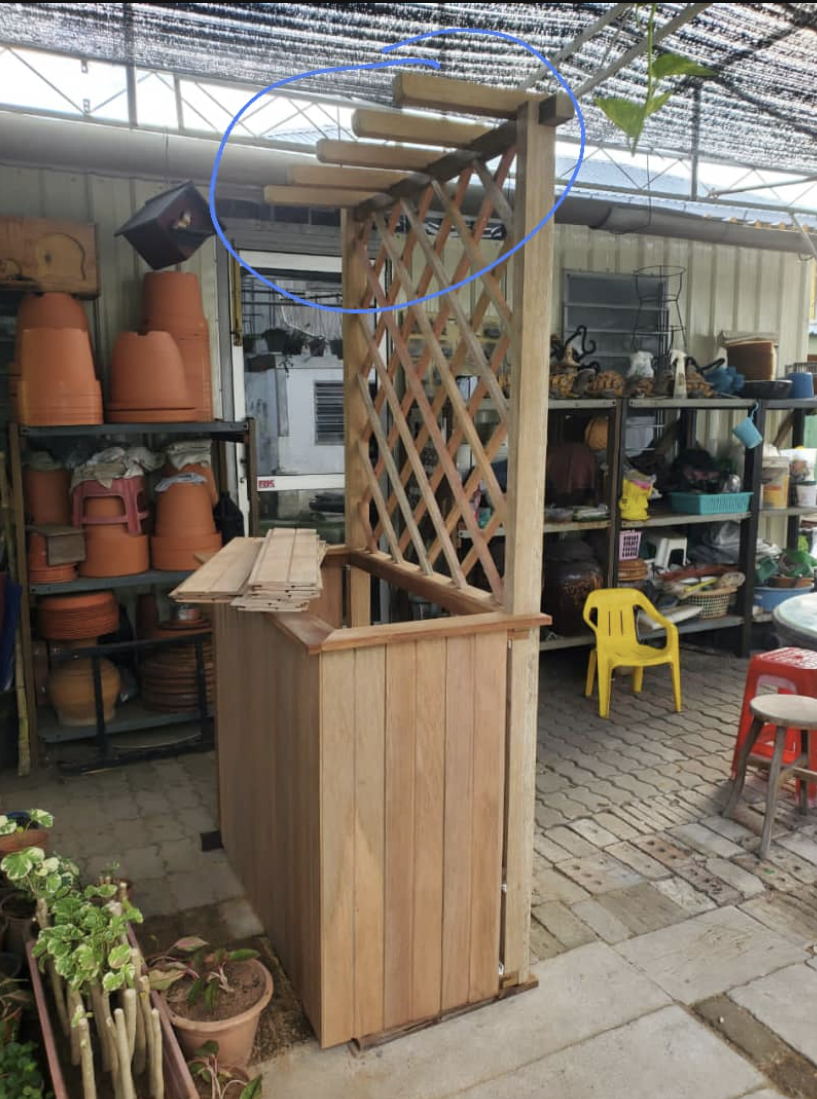 Timber planter box with lattice trellis screen and pergola-style arbour top, built by GP FloraL